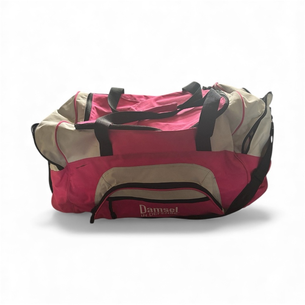 Damsel In Defense Duffle Bag